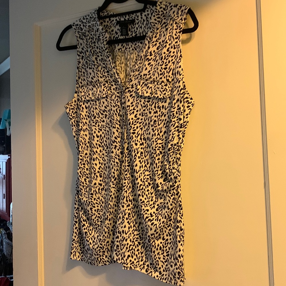 Sleeveless blouse.  Bottom down. Perfect